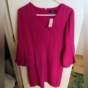 Size 8 Isaac Mizrahi dress never worn with tags still on. Original price $129.